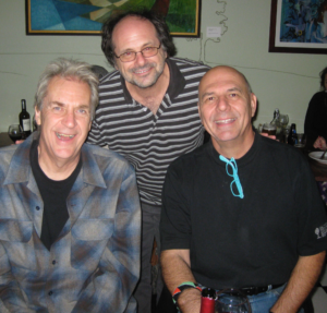 Pete Thomas, Jim Bessman (music journalist for Billboard and other trades) and me.)